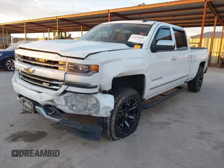 2016 Chevrolet Silverado 1500 LTZ with VIN 3GCUKSEJ0GG221628, listed as a IAAI auction lot 41276045 with 153,476 mi miles. Bid and sale history available at carsss.com. Image 2.