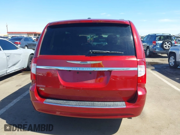 2014 Chrysler Town & Country Touring with VIN 2C4RC1BG9ER326259, listed as a IAAI auction lot 42160484 with 151,896 mi miles and . Bid and sale history available at DreamBid. Image 16.