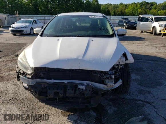 2017 Ford Focus SE with VIN 1FADP3F28HL309268, listed as a Copart auction lot 57995985 with 99,277 mi miles and Salvage title. Bid and sale history available at DreamBid. Image 5.