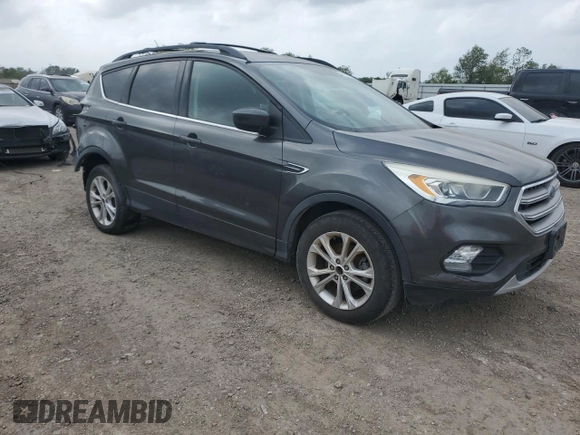 2017 Ford Escape SE with VIN 1FMCU0GD6HUD28114, listed as a Copart auction lot 51626095 with 98,701 mi miles and Clean Title. Bid and sale history available at carsss.com. Image 4.