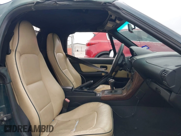 1999 BMW Z3 z VIN 4USCH3336XLF40956, wystawiony jako IAAI lot #41940092 z przebiegiem 198 612 mil mil oraz . Historia ofert i sprzedaży dostępna na DreamBid. Obrazek 5.