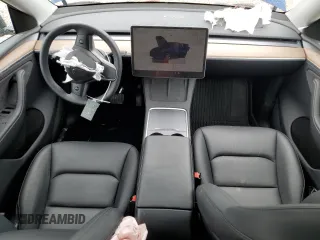 2024 Tesla Model Y Long Range с VIN 7SAYGDEE8RA270862, выставлен на аукционе Copart как лот 58099875 с пробегом 24 856 миль миль и На запчасти • Non repairable. История ставок и продаж доступна на DreamBid. Изображение 8.