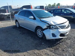 2013 Toyota Corolla L with VIN 5YFBU4EE7DP166021, listed as a IAAI auction lot 42027062 with 179,107 mi miles and . Bid and sale history available at DreamBid. Image 1.