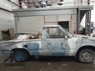 1982 Datsun 720 z VIN JN6MD01S7CW103064, wystawiony jako IAAI lot #41831434 z przebiegiem 175 954 mil mil oraz . Historia ofert i sprzedaży dostępna na DreamBid. Obrazek 12.