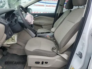 2014 Ford Escape SE z VIN 1FMCU9GX2EUC85787, wystawiony jako Copart lot #52739085 z przebiegiem 123 641 mil mil oraz Szkoda całkowita • Salvage title. Historia ofert i sprzedaży dostępna na DreamBid. Obrazek 7.