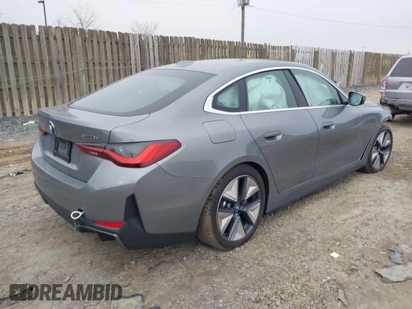 2024 BMW i4 eDrive35 z VIN WBY43AW05RFT22034, wystawiony jako IAAI lot #41545162 z przebiegiem 1499 mil mil oraz . Historia ofert i sprzedaży dostępna na DreamBid. Obrazek 4.