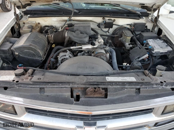 1999 Chevrolet Tahoe with VIN 1GNEC13R2XJ556769, listed as a Copart auction lot 77561624 with 205,238 mi miles and Non Repairable. Bid and sale history available at carsss.com. Image 12.