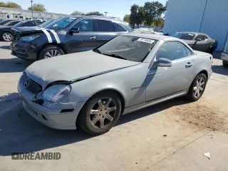 2001 Mercedes-Benz SLK-Class Kompressor with VIN WDBKK49F61F187940, listed as a Copart auction lot 76110434 with 95,053 mi miles and Clean Title. Bid and sale history available at carsss.com. Image 1.