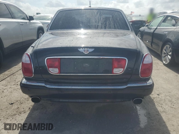 2006 Bentley Arnage R с VIN SCBLC37F26CX11385, выставлен на аукционе Copart как лот 76563524 с пробегом 23 197 миль миль и Списание • Salvage title. История ставок и продаж доступна на DreamBid. Изображение 6.