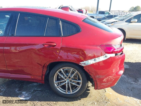 2021 BMW X4 xDrive30i with VIN 5UX2V1C0XM9H70348, listed as a IAAI auction lot 41209981 with 45,706 mi miles. Bid and sale history available at carsss.com. Image 6.