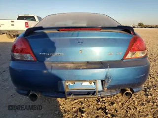 2005 Hyundai Tiburon GT z VIN KMHHN65F35U186438, wystawiony jako Copart lot #41879955 z przebiegiem 152 574 mil mil oraz Szkoda całkowita • Salvage title. Historia ofert i sprzedaży dostępna na DreamBid. Obrazek 6.