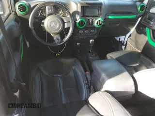 2015 Jeep Wrangler Unlimited Rubicon z VIN 1C4BJWFG7FL547951, wystawiony jako Copart lot #55268705 z przebiegiem 141 018 mil mil oraz Czysty tytuł • Clean title. Historia ofert i sprzedaży dostępna na DreamBid. Obrazek 8.