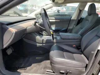 2023 Tesla Model 3 z VIN 5YJ3E1EA7PF549051, wystawiony jako Copart lot #58932765 z przebiegiem 8 800 mil mil oraz Szkoda całkowita • Salvage title. Historia ofert i sprzedaży dostępna na DreamBid. Obrazek 7.