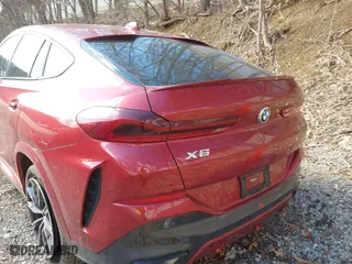 2021 BMW X6 xDrive40i with VIN 5UXCY6C01M9F72797, listed as a IAAI auction lot 41810317 with 16,084 mi miles. Bid and sale history available at carsss.com. Image 12.