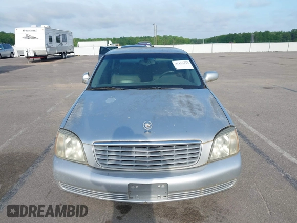 2003 Cadillac DeVille with VIN 1G6KD54YX3U102528, listed as a IAAI auction lot 42159424 with 108,720 mi miles. Bid and sale history available at carsss.com. Image 6.