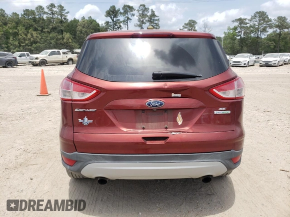 2014 Ford Escape SE z VIN 1FMCU0GX6EUA02674, wystawiony jako Copart lot #57833695 z przebiegiem 61 872 mil mil oraz Szkoda całkowita • Salvage title. Historia ofert i sprzedaży dostępna na DreamBid. Obrazek 6.