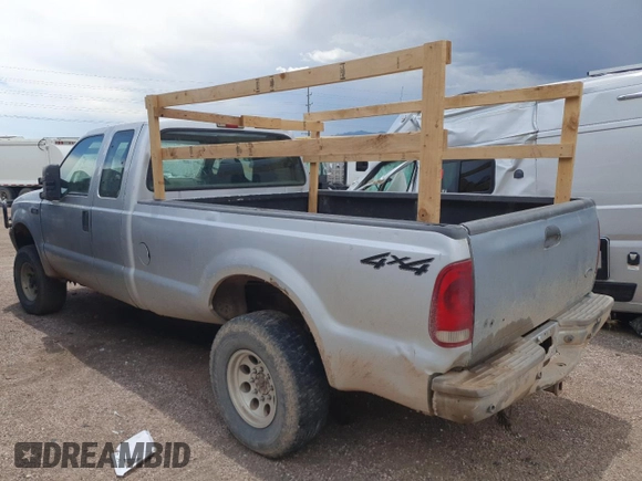 2001 Ford F-250 XL with VIN 1FTNX21L31EB70699, listed as a Copart auction lot 60620065 with 156,033 mi miles and Clean title. Bid and sale history available at DreamBid. Image 2.