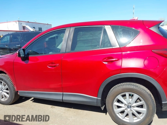 2016 Mazda CX-5 Sport with VIN JM3KE4BY7G0805631, listed as a IAAI auction lot 42028606 with 93,659 mi miles and . Bid and sale history available at carsss.com. Image 14.