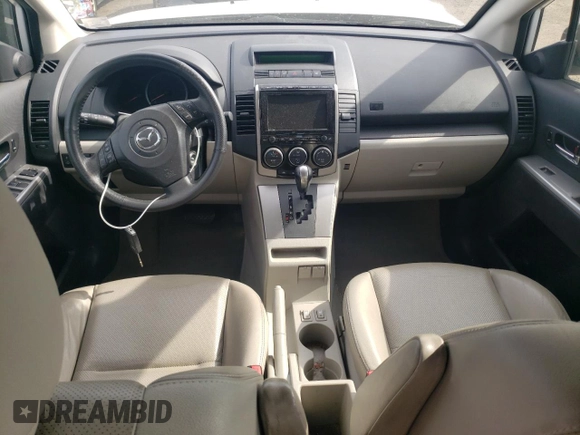 2010 Mazda 5 Sport with VIN JM1CR2WL6A0362562, listed as a Copart auction lot 54691615 with 102,429 mi miles and Salvage Title. Bid and sale history available at DreamBid. Image 8.