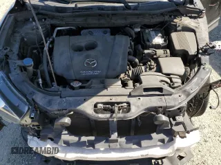 2016 Mazda CX-5 Touring z VIN JM3KE2CY5G0617516, wystawiony jako Copart lot #56421005 z przebiegiem 110 739 mil mil oraz Szkoda całkowita • Salvage title. Historia ofert i sprzedaży dostępna na DreamBid. Obrazek 12.