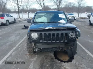 2014 Jeep Patriot Latitude with VIN 1C4NJRFBXED687701, listed as a IAAI auction lot 41399153 with 109,783 mi miles. Bid and sale history available at carsss.com. Image 6.
