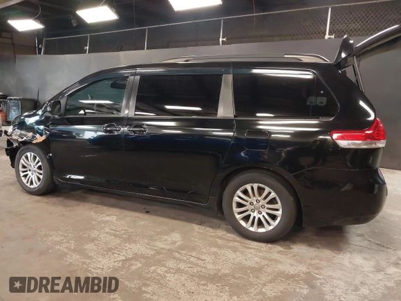 2012 Toyota Sienna XLE AAS with VIN 5TDYK3DCXCS208178, listed as a IAAI auction lot 41788262 with 329,823 mi miles and . Bid and sale history available at carsss.com. Image 3.
