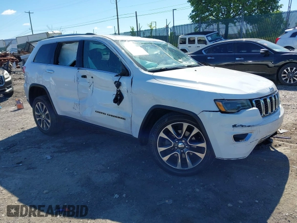 2018 Jeep Grand Cherokee Limited with VIN 1C4RJFBG7JC245931, listed as a IAAI auction lot 42206747 with 100,414 mi miles and . Bid and sale history available at DreamBid. Image 1.