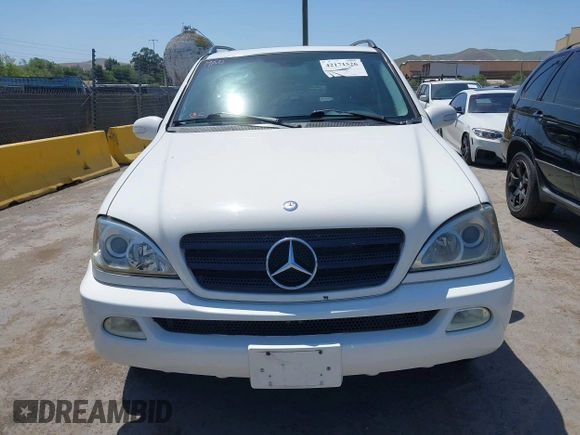 2002 Mercedes-Benz M 320/430/500 z VIN 4JGAB54E92A362578, wystawiony jako IAAI lot #42171526 z przebiegiem 172 623 mil mil oraz . Historia ofert i sprzedaży dostępna na DreamBid. Obrazek 6.