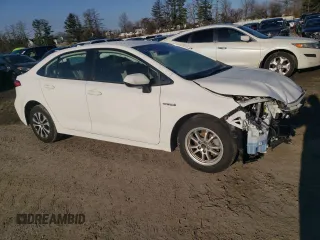 2021 Toyota Corolla Hybrid LE with VIN JTDEAMDE5MJ011169, listed as a Copart auction lot 88752265 with 52,994 mi miles and Salvage Title. Bid and sale history available at carsss.com. Image 4.