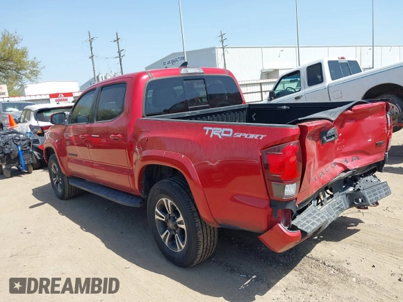 2018 Toyota Tacoma SR5 with VIN 5TFAZ5CN0JX063350, listed as a IAAI auction lot 41829396 with 61,155 mi miles and . Bid and sale history available at DreamBid. Image 3.