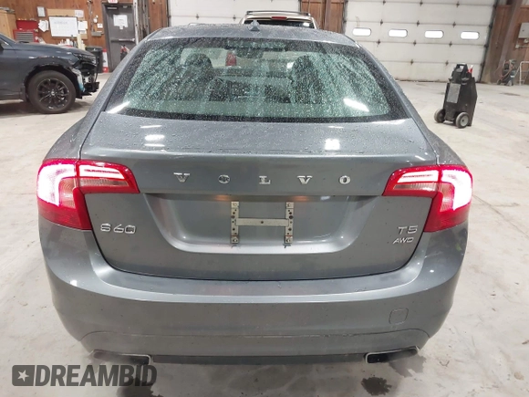2016 Volvo S60 T5 Premier z VIN YV1612TK0G2410743, wystawiony jako IAAI lot #41717318 z przebiegiem 87 087 mil mil oraz . Historia ofert i sprzedaży dostępna na DreamBid. Obrazek 16.