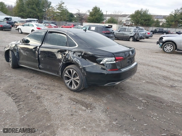 2021 Volkswagen Passat 2.0T SE with VIN 1VWSA7A34MC019031, listed as a IAAI auction lot 41150221 with 50,796 mi miles. Bid and sale history available at carsss.com. Image 3.