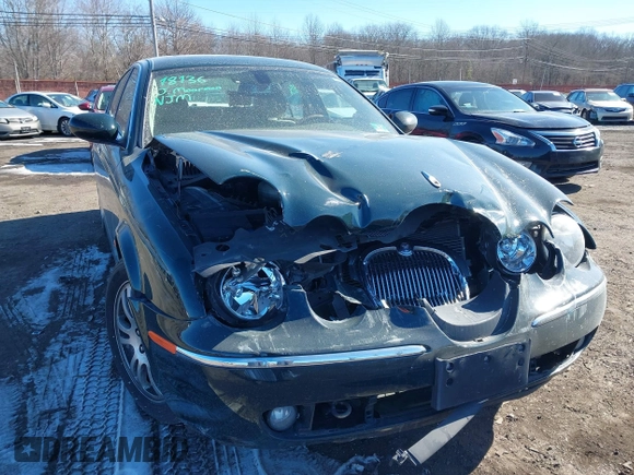 2005 Jaguar S-Type with VIN SAJWA01T95FN51551, listed as a IAAI auction lot 41637854 with 90,075 mi miles and . Bid and sale history available at DreamBid. Image 18.