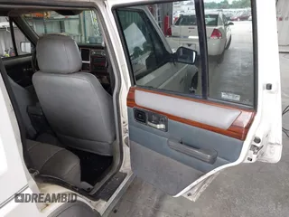 1996 Jeep Cherokee Country z VIN 1J4FT78S0TL280645, wystawiony jako IAAI lot #42340813 z przebiegiem 288 418 mil mil oraz . Historia ofert i sprzedaży dostępna na DreamBid. Obrazek 8.