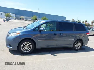 2014 Toyota Sienna XLE with VIN 5TDYK3DC5ES447155, listed as a IAAI auction lot 42003951 with 60,064 mi miles and . Bid and sale history available at DreamBid. Image 14.