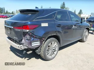 2020 Lexus RX with VIN 2T2JZMDA2LC223392, listed as a IAAI auction lot 42028542 with 55,739 mi miles. Bid and sale history available at carsss.com. Image 4.