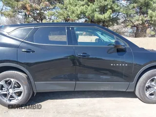 2023 Chevrolet Blazer LT z VIN 3GNKBCR43PS113400, wystawiony jako IAAI lot #41829908 z przebiegiem 22 858 mil mil oraz . Historia ofert i sprzedaży dostępna na DreamBid. Obrazek 13.