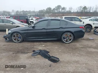 2022 BMW 5 Series M550i xDrive z VIN WBA13BK01NCH76521, wystawiony jako IAAI lot #41904437 z przebiegiem Nie podano mil oraz . Historia ofert i sprzedaży dostępna na DreamBid. Obrazek 15.