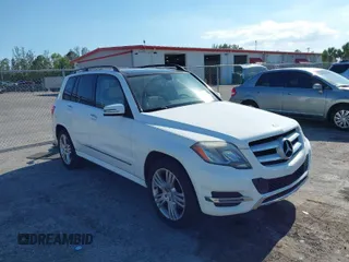 2015 Mercedes-Benz GLK 350 with VIN WDCGG5HB6FG338932, listed as a IAAI auction lot 42027674 with 107,182 mi miles and . Bid and sale history available at DreamBid. Image 1.