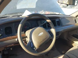 2001 Ford Crown Victoria with VIN 2FAFP73W71X112219, listed as a IAAI auction lot 41879317 with 159,344 mi miles. Bid and sale history available at carsss.com. Image 14.