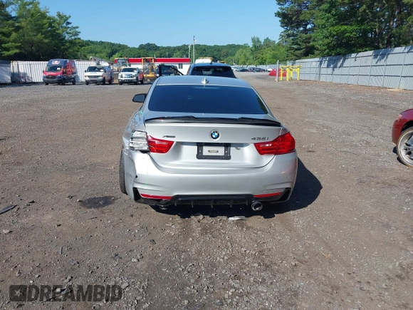 2015 BMW 4 Series 435i xDrive z VIN WBA3R5C51FK372061, wystawiony jako IAAI lot #42546096 z przebiegiem 163 692 mil mil oraz . Historia ofert i sprzedaży dostępna na DreamBid. Obrazek 16.