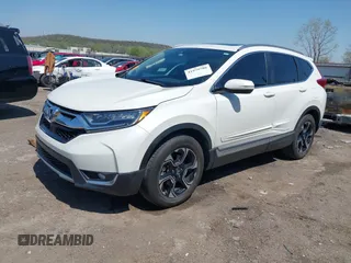 2018 Honda CR-V Touring with VIN 2HKRW2H93JH686298, listed as a IAAI auction lot 41979786 with 100,087 mi miles. Bid and sale history available at carsss.com. Image 17.