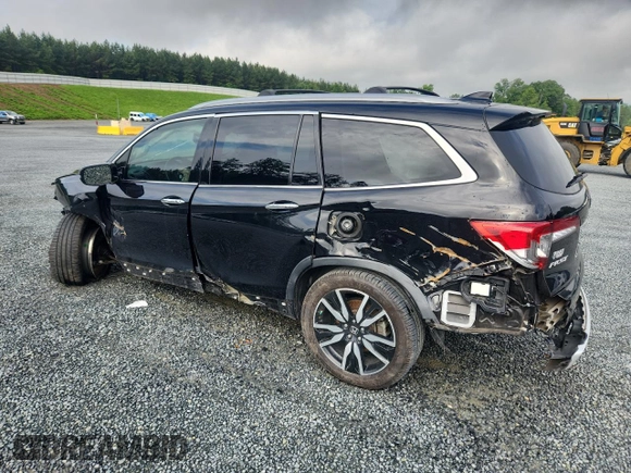2019 Honda Pilot Elite with VIN 5FNYF6H05KB071031, listed as a Copart auction lot 60777585 with 96,155 mi miles and Salvage title. Bid and sale history available at DreamBid. Image 2.