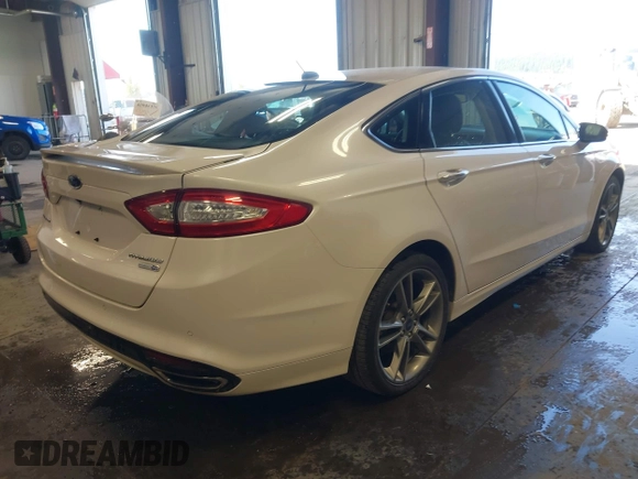 2016 Ford Fusion Titanium z VIN 3FA6P0D93GR116355, wystawiony jako IAAI lot #42158991 z przebiegiem 59 602 mil mil oraz . Historia ofert i sprzedaży dostępna na DreamBid. Obrazek 4.