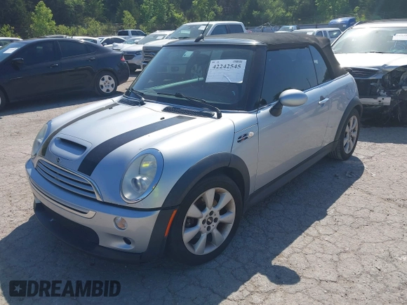 2006 MINI Convertible S with VIN WMWRH33596TK59633, listed as a IAAI auction lot 42242545 with 77,837 mi miles and . Bid and sale history available at DreamBid. Image 2.
