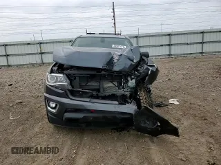 2015 Chevrolet Colorado 4WD Z71 z VIN 1GCGTCE37F1236156, wystawiony jako Copart lot #54987475 z przebiegiem 198 656 mil mil oraz Szkoda całkowita • Salvage title. Historia ofert i sprzedaży dostępna na DreamBid. Obrazek 13.