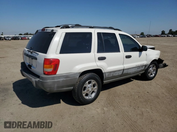 1999 Jeep Grand Cherokee Laredo с VIN 1J4G258S8XC735159, выставлен на аукционе Copart как лот 56247505 с пробегом 241 636 миль миль и Списание • Salvage title. История ставок и продаж доступна на DreamBid. Изображение 3.