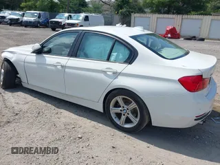 2015 BMW 3 Series 328i xDrive with VIN WBA3B5G56FNS15848, listed as a IAAI auction lot 42537645 with 121,742 mi miles and . Bid and sale history available at DreamBid. Image 3.