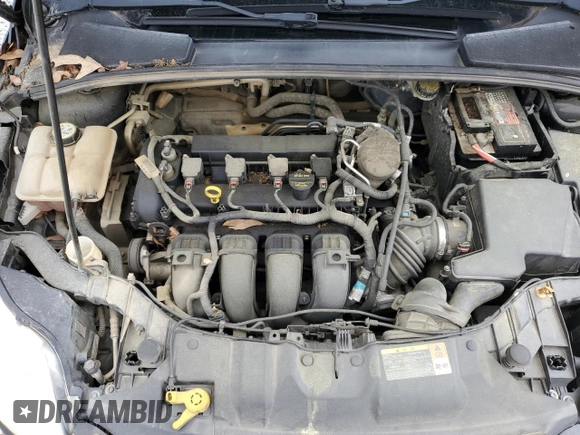 2013 Ford Focus SE z VIN 1FADP3F24DL216824, wystawiony jako Copart lot #52142715 z przebiegiem 149 611 mil mil oraz Szkoda całkowita • Salvage title. Historia ofert i sprzedaży dostępna na DreamBid. Obrazek 11.