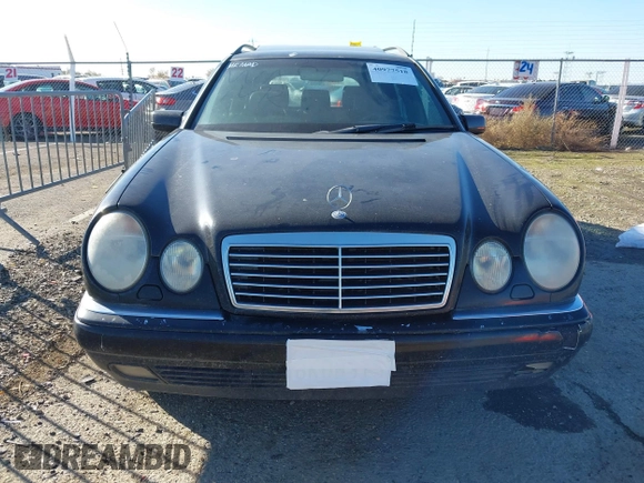 1999 Mercedes-Benz E-Class with VIN WDBJH82F2XX027360, listed as a IAAI auction lot 40977518 with 1 mi miles. Bid and sale history available at carsss.com. Image 6.